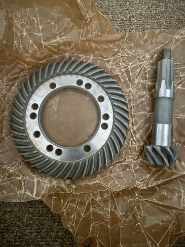 Crown wheel and - and, m