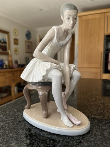 Nao lladro figurine - by,