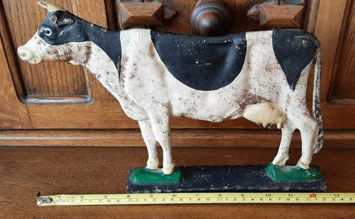 Antique cast iron dairy - cast,