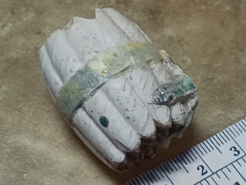Clay pipe with bunch of - with,