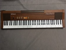 1980's Roland Piano Plus 70 piano keyboard in very good condition.