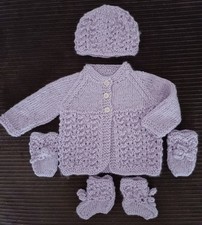 Hand knitted prem baby girl
