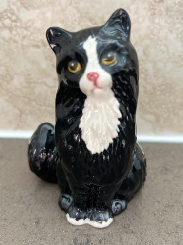 Royal doulton seated - black, &