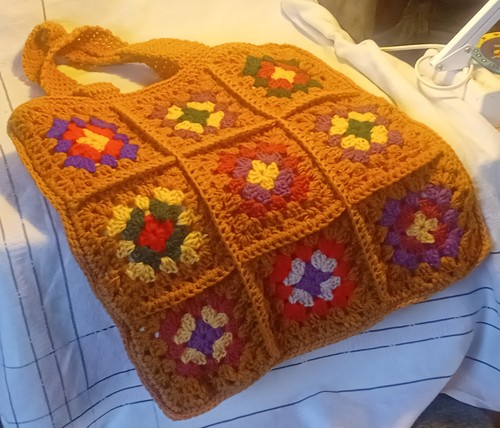 Hand crochet granny square bag - hand,