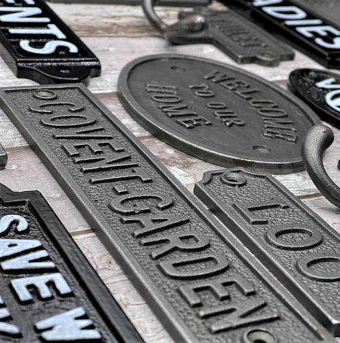 Wall plaque sign cast - cast, iron
