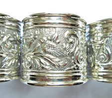 4 VICTORIAN SILVER NAURALISTIC NAPKIN RINGS WITH BIRDS ANTIQUE. LEVI & SALAMAN
