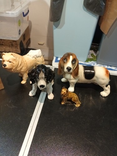 Vintage dog figures is - 4,