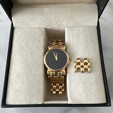 GUCCI  MENS WATCH GOLD PLATED SWISS QUARTZ WITH GUCCI DIAL.