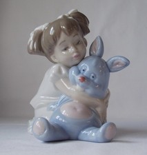 NAO BY LLADRO GIRL WITH TOY