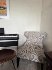 Eliza chair is a deeply padded