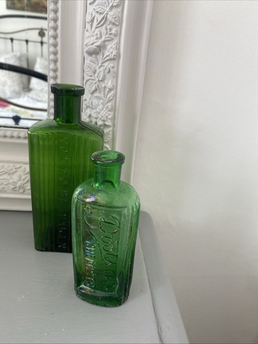 Two green glass vintage poison - vintage,
