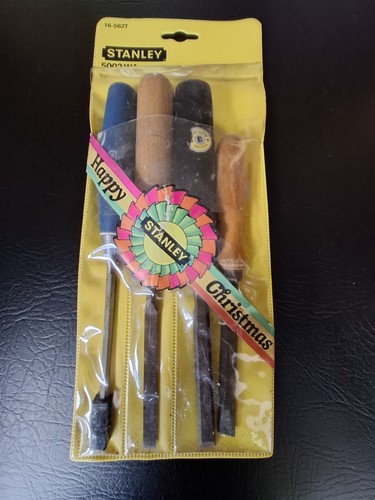 Four random wood - chisels, in