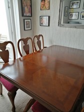 Heavy Cherry wood  dining suite, Table and 8 chairs. Table fully extended 7ft.