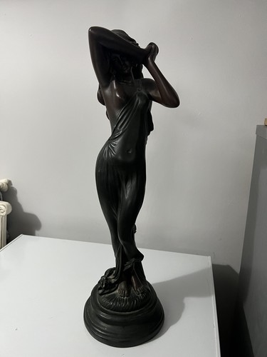 Antique vintage statue of - /,