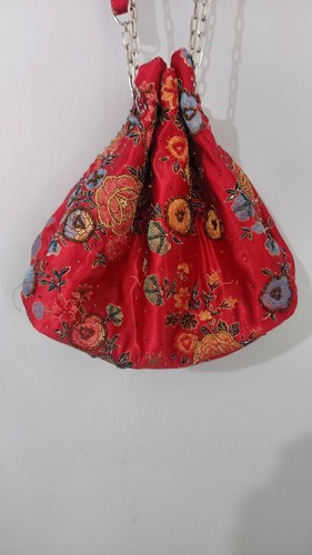 This red satin handbag - this, is