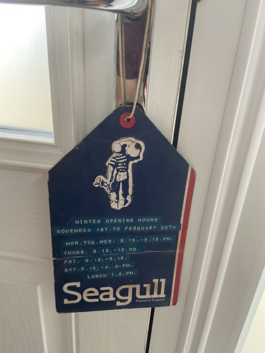 British seagull shop sign - british,