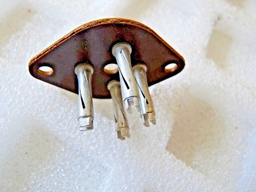 Spiral cut paxolin valve - paxolin,