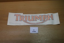 Triumph 2307640 Emblem NOS NEW Genuine xx13304