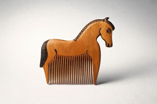 Hand carved horse - hand, comb