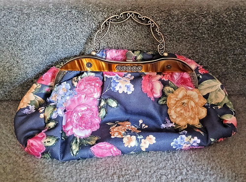 Butler and wilson black - wilson, floral
