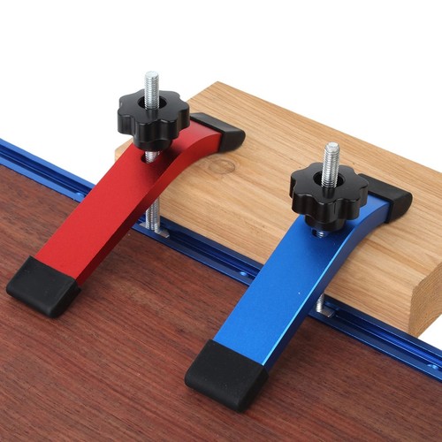 Quick acting track hold down - quick,