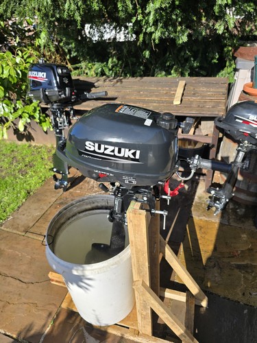 Suzuki 5hp stroke outboard - 4,
