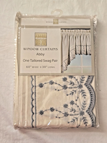 Tailored swag pair window - 1-tailored,