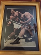 Boxing! Rocky Marciano vs. Roland LaStarza 1953 Sports Page Autographed.