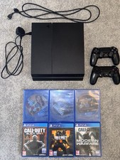 PS4 500GB Bundle 6 Games + 2
