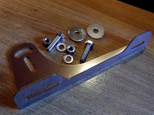 Front number plate offset