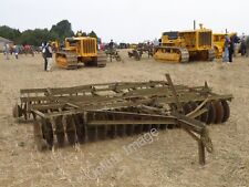 Photo 6x4 Old farm equipment Stamford/TF0207 Trailed disc harrows in fro c2009