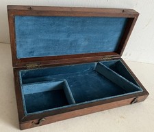 ANTIQUE CASE TAKES A SMALL