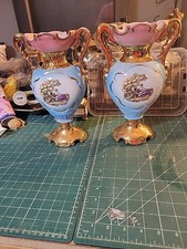 A Pair Of Roman Style Vases