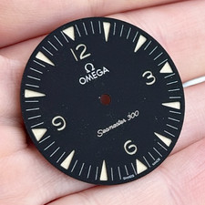 An Omega Seamaster 300 Dial, Hands & Crown for ref 234.30.41.21.01.001