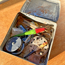 Vintage tin of old fishing equipment reels floats weights hooks box antique