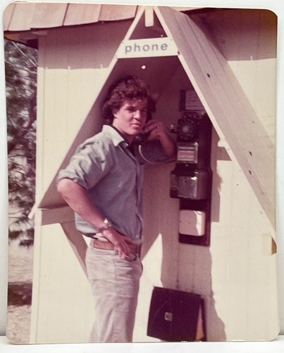 1970s handsome man payphone - 1970s,