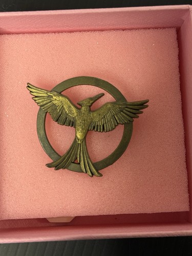 The hunger games bird logo