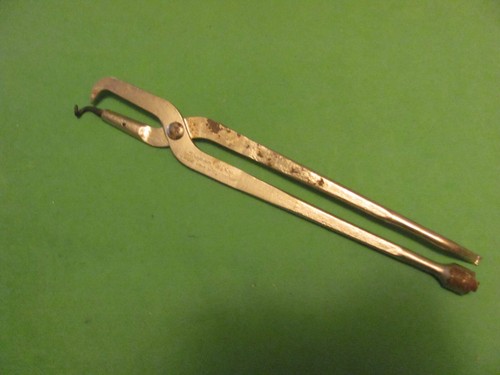 Vintage snap brake spring - on,