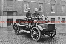 F001879 Firemen in brass