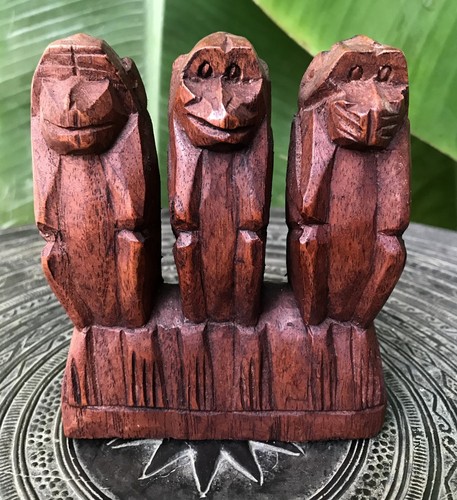 Three wooden wise - three, monkeys