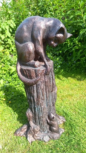 Garden sculpture cat and - cat,