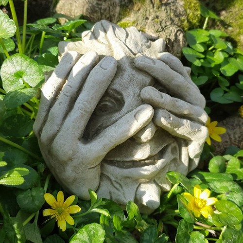 Peeping green man stone - peeping,
