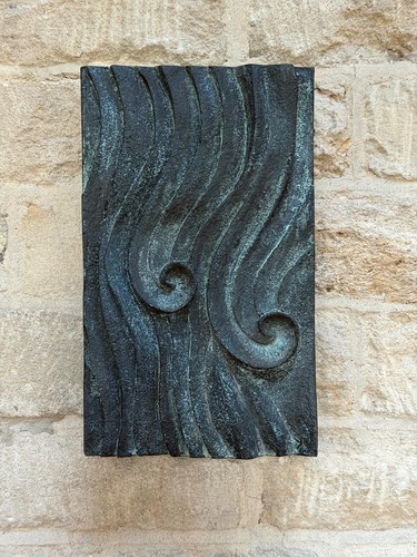 Wall sculpture with wave - sculpture, a