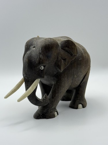 Hand carved wooden elephant - hand,