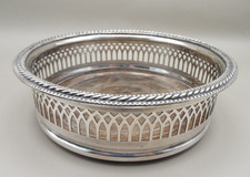 PIERCED SILVER PLATE & WOOD