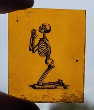 Stained Glass Skeleton praying