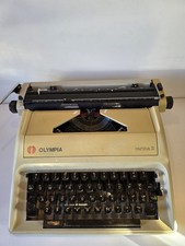 Vintage Olympia Carina 2