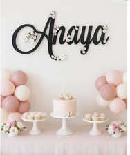 Large wooden name sign