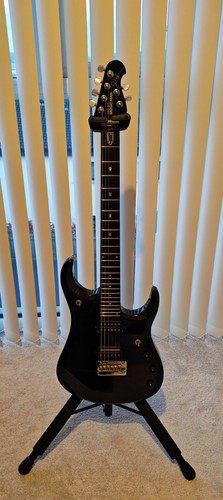 Ernie ball music man - ernie,