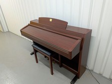 Yamaha Clavinova CLP-230 digital piano and stool in mahogany stock #25551